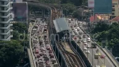 多层次交通道路、铁路和火车站的时间流逝镜头。 泰国曼谷