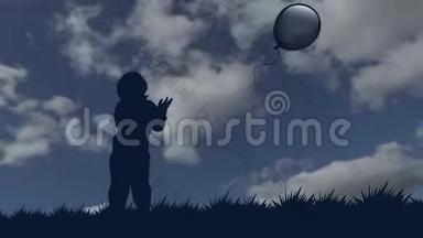 小男孩让气球飞向天空。 一个男孩在气球的背景下固定的剪影