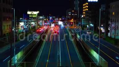 东京市中心的<strong>一条街</strong>在夜间长时间曝光的变焦镜头