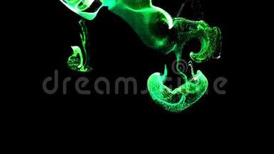 绿色发光粒子的抽象动画背景，液体流中发光粒子的美丽效果，如