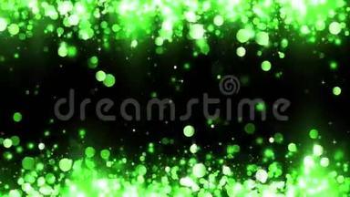 背景有闪亮的绿色粒子。 闪闪发光的粒子。 漂亮的bokeh光背景。 绿色的纸屑闪闪发光，光亮