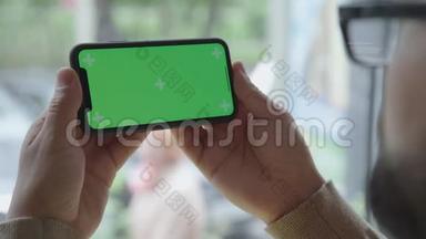 小玩意，屏幕用绿色屏幕。 一款带有色度的智能手机