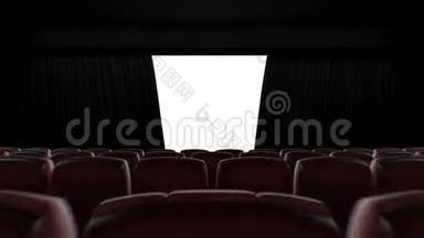 穿过黑暗的现代<strong>电影</strong>院<strong>大</strong>厅在座位上移动到开幕<strong>屏</strong>幕。 美丽的3D动画与绿色