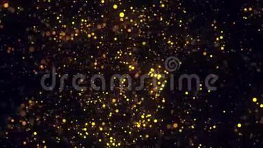 在黑色背景上闪烁的金色粒子旋转的抽象动画。 录像。 彩色动画