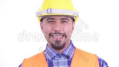 脸上挂着幸福胡子的波斯人建筑工人微笑