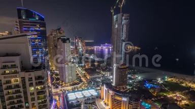 阿联酋迪拜Jumeirah海滩JBR酒店的现代摩天<strong>大楼</strong>和海滩的鸟瞰夜景