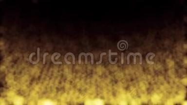 抽象的金色模糊的闪光尘埃从上到下流动。 在黑色运动的黄色模糊的小颗粒