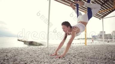 反重力瑜伽，女人做瑜伽练习