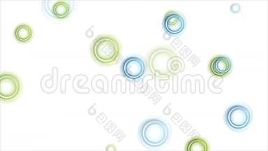 白色背景视频动画上的绿色和蓝色圆圈