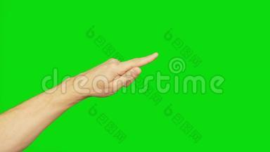 左手用食指，隔离在绿色屏幕上。 手指指向屏幕的角落。 快关门。 阿尔法通道