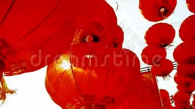 红灯笼在风中摇曳，在阳光的背后，东方元素，中国新年。