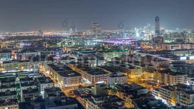 阿联酋迪拜，具有典型建筑物夜间时间推移的Deira居民区的鸟瞰图