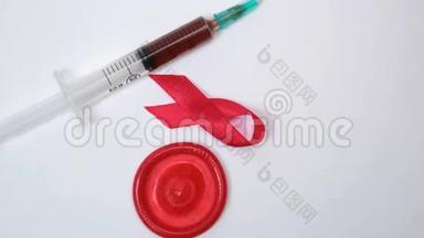 带血样的红带避孕套和注射器