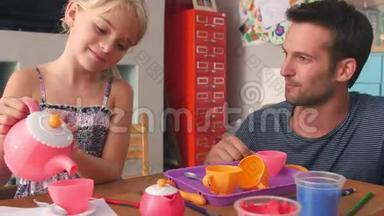 父亲与女儿在卧室举行茶会