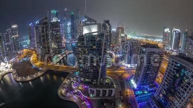 迪拜海滨住宅和办公室摩天大楼的空中景观，带海滨夜景