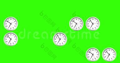 许多时钟显示，是时候起床吃早餐了，现代白色金属闹钟在色度键绿色屏幕背景