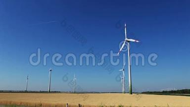 蓝天绿色能源镜头上的风力涡轮机