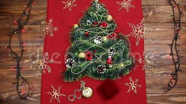 一种小的圣诞树，由金属、坚果、丝带和装饰品组成。 圣诞树的礼物，老式手表。 2018，