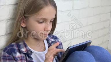 儿童游戏平板电脑，儿童智能手机，女孩阅读信息浏览互联网