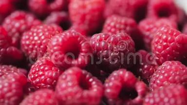 关闭贝瑞。 新鲜，多汁的覆盆子背景，成熟.. 大红色覆盆子果实。 新鲜树莓水果作为食物