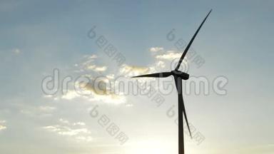 日落时风力涡轮机能源塔移动