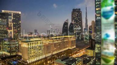 迪拜市中<strong>心</strong>的塔楼日夜不停。 日落后带摩天大楼的谢赫<strong>扎</strong>耶德公路的鸟瞰图。