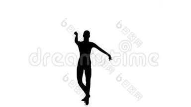 优雅的<strong>女舞者</strong>表演萨尔萨舞，剪影。 白色背景，慢动作
