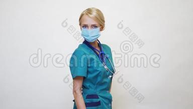 医生护士带听诊器的妇女戴着防护面罩和橡胶或乳胶手套