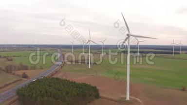 夏季的风力涡轮机和农田-清洁和可再生能源的能源生产-空中拍摄。
