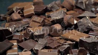 深色或牛奶有机巧克力、可可粉和深色混凝土背景的松露糖果
