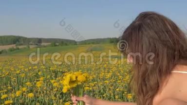 女人采花，聚集在盛开的田野里，一束黄色的蒲公英
