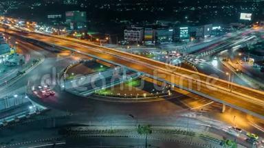 泰国曼谷夜间4路停车街交叉路口环形交叉路口夜间城市交通时间的推移。 4KUHD水平